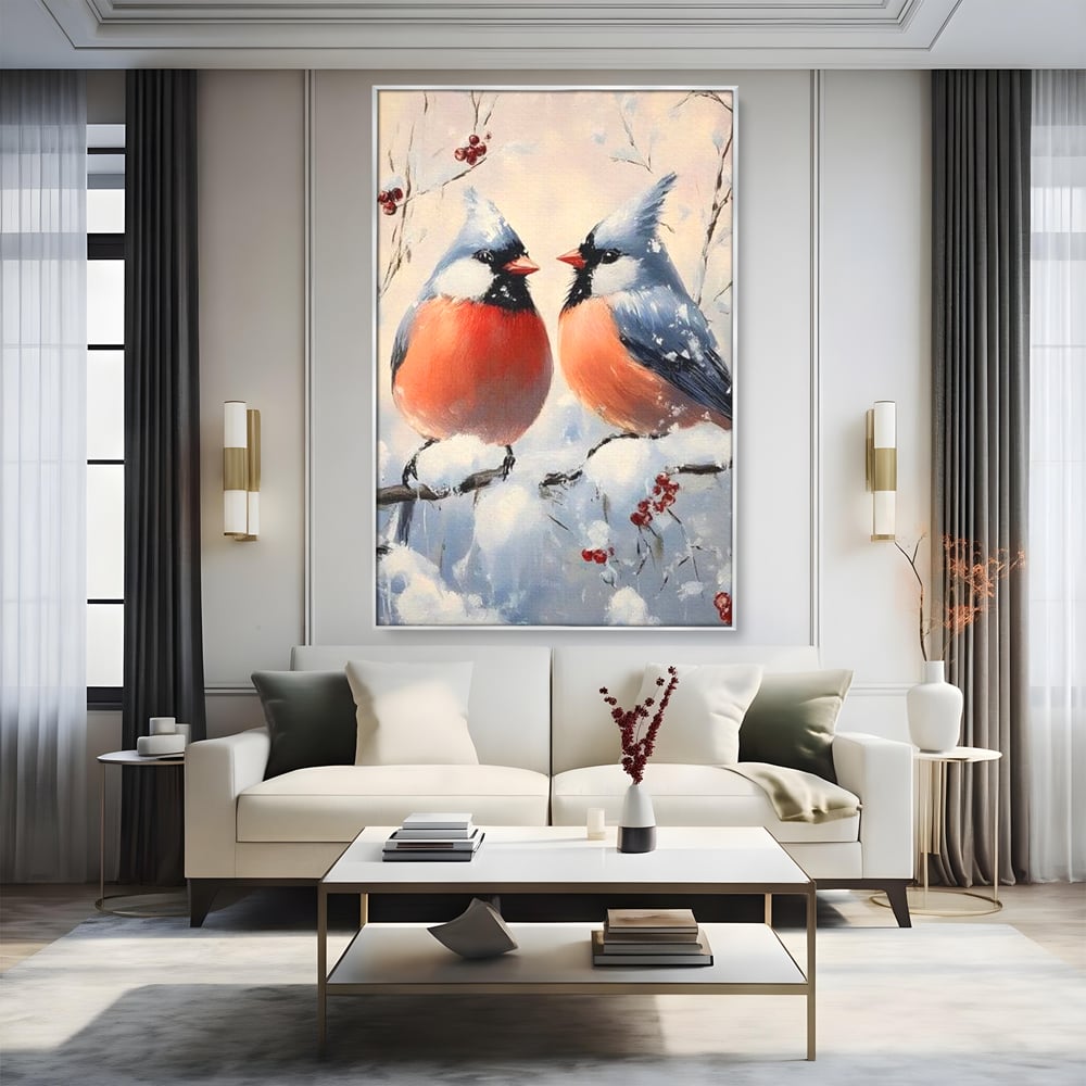 Tablou canvas cu tablou canvas cu doi pasari cardinali in iarna, in rama de aluminiu argintiu, pe perete intr-un living